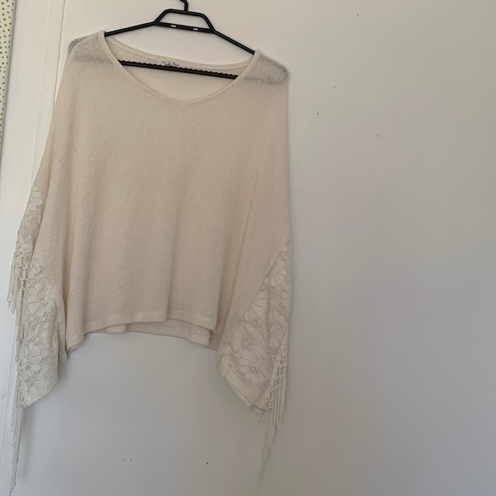 Poncho with sleeves